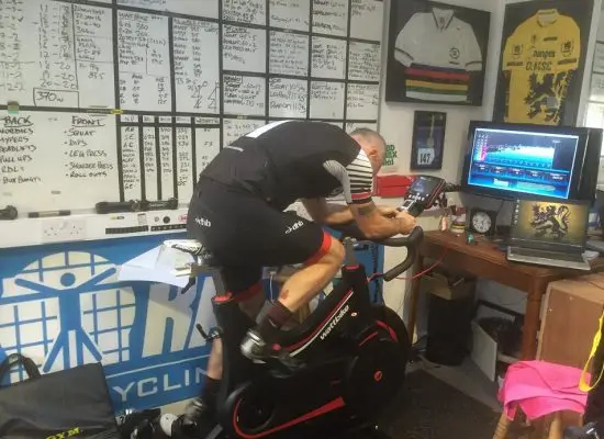 Athlete training on the wattbike in the gym
